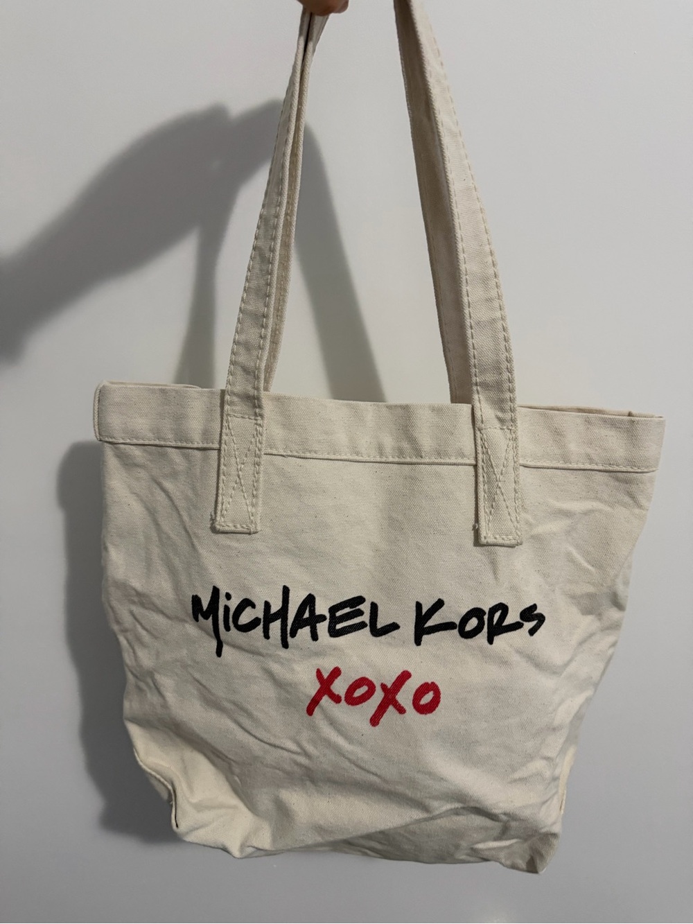 Michael Kors Cream Canvas Tote with Black Logo and Red Accent